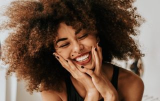Girl with healthy teeth smiling