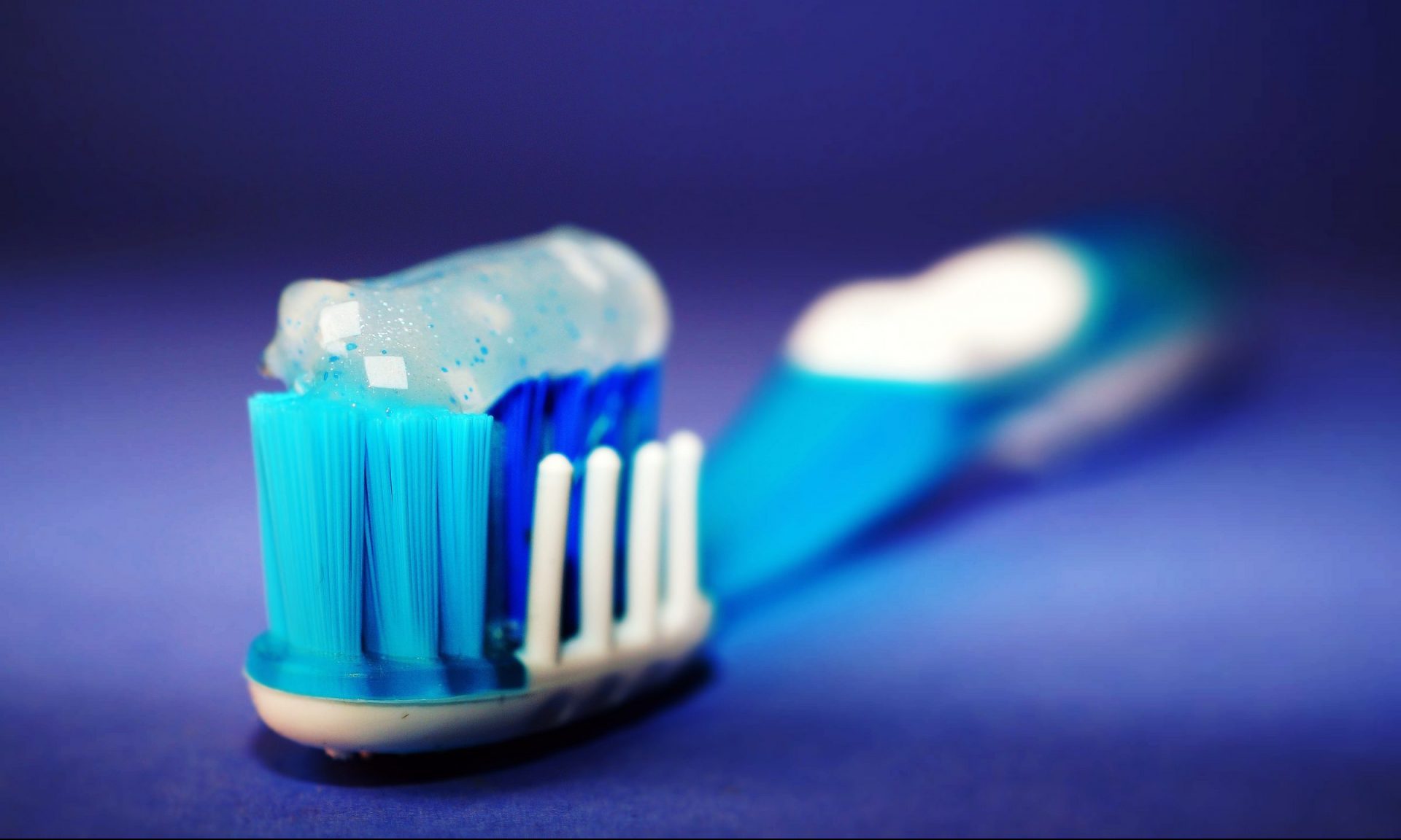 Closeup of toothbrush with toothpaste