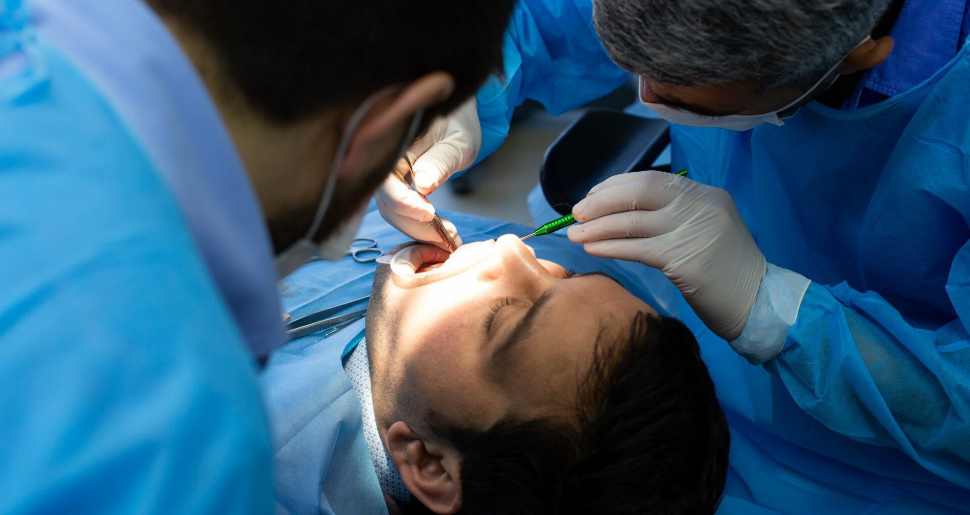 Patient going through dental surgery