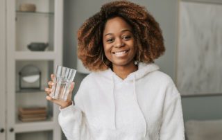 Woman drinking a fresh glass of water