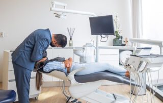 Dentist performing root canal