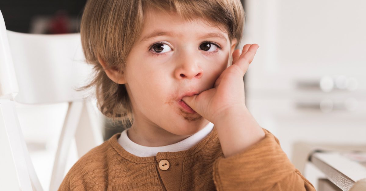Child with thumb in mouth