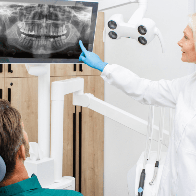 health professional talks health professional talks to the patient before oral surgery