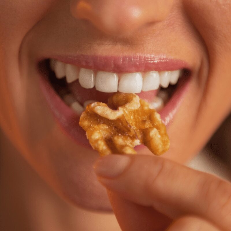 woman enjoying chewy food
