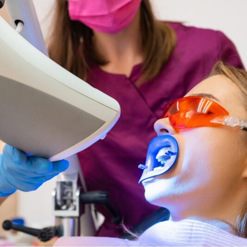 woman-getting-her-teeth-professional-whitened