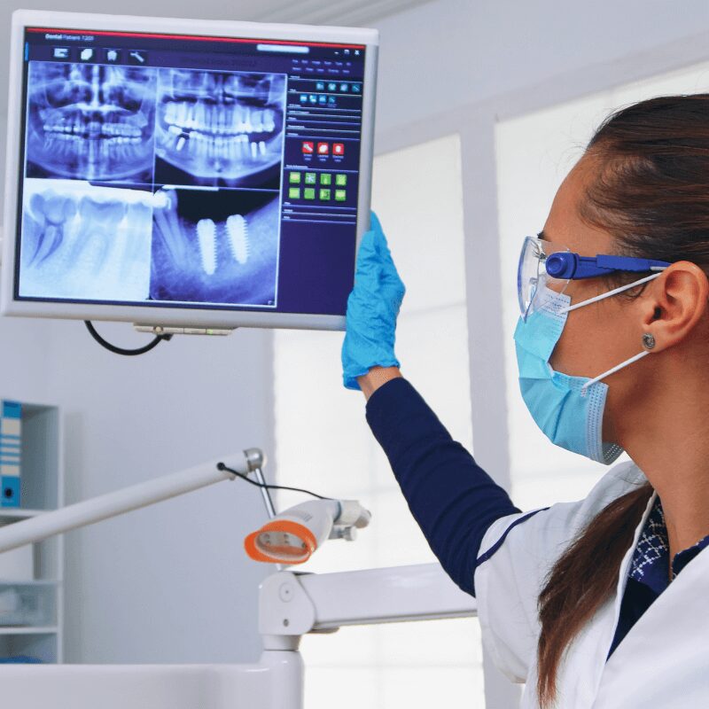 dentist-doctor-patient-looking-digital-teeh-x-ray-dental-office dentist-doctor-patient-looking-digital-teeh-x-ray-dental-office