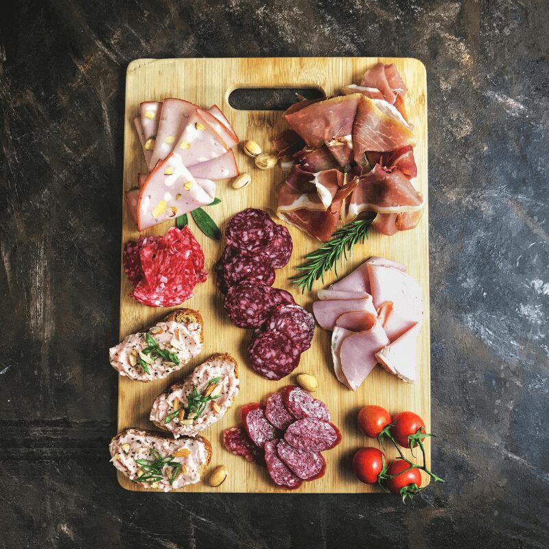 sliced-meats-on-wooden-chopping-board