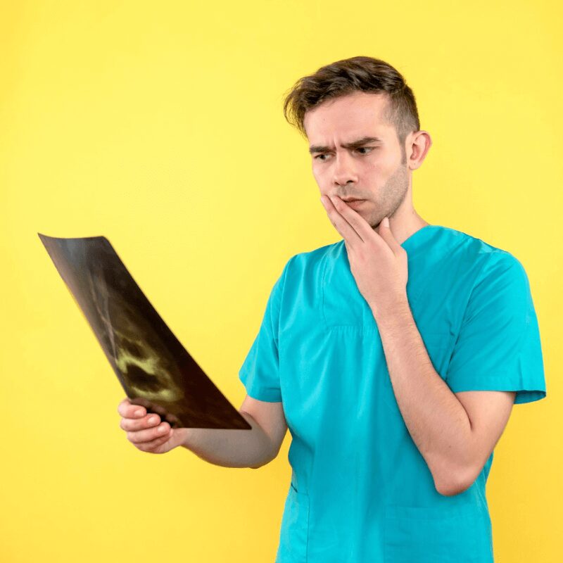 boy looking at dental xray boy looking at dental xray
