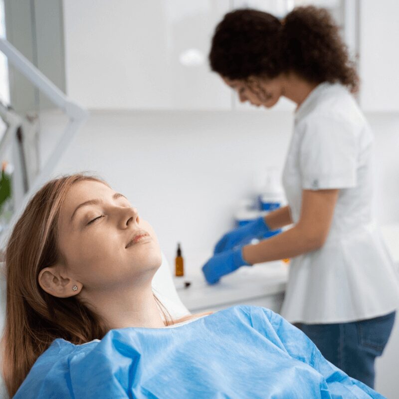 female patient sedated for dental implant bone grafting procedure, comfort dentistry