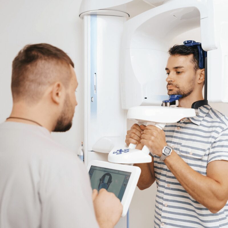 young man gets cbct scan for full mouth