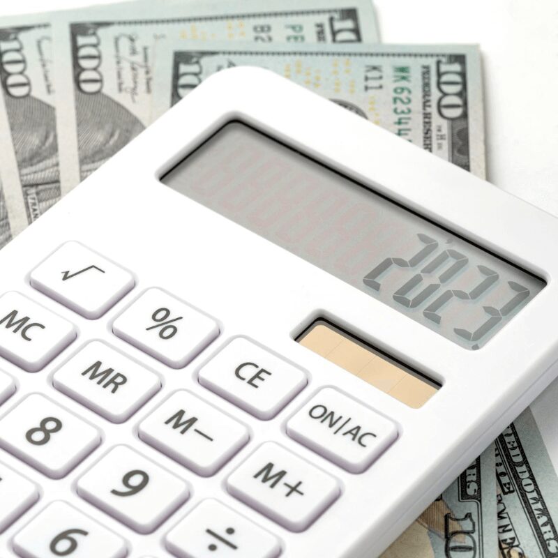 calculating cost of dental bridge vs implants