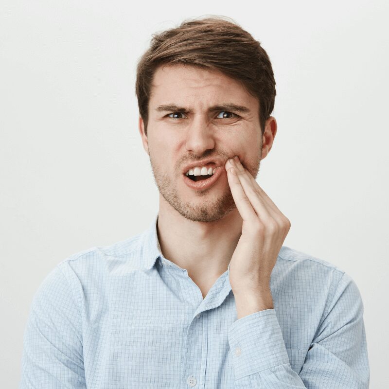 cracked tooth hurts, young white man cracked tooth hurts, young white man