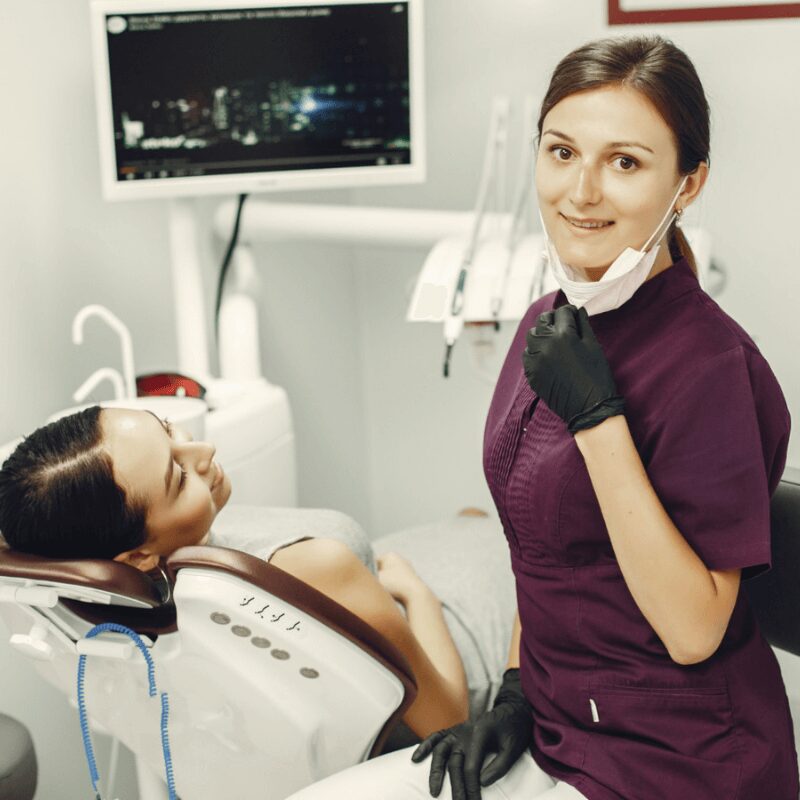 dentist checking patient for teeth problems dentist checking patient for teeth problems