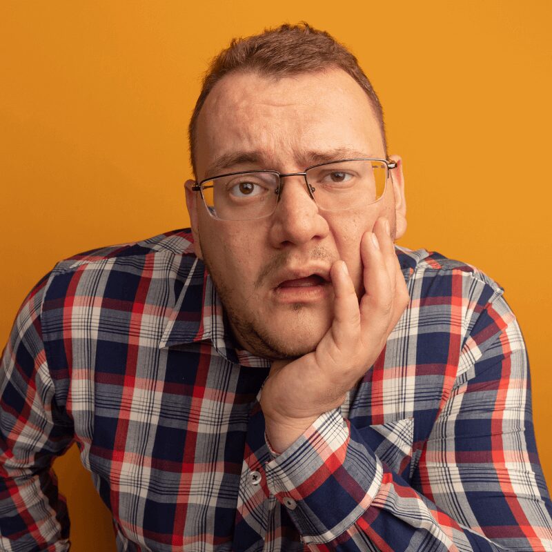 man worries about tartar on his teeth