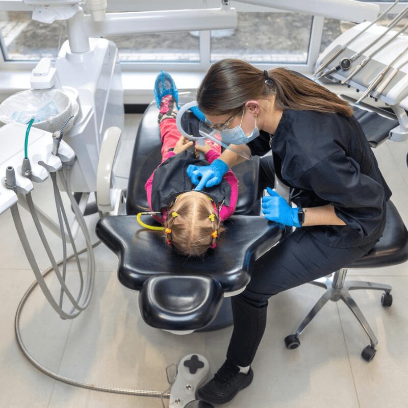 female-dentist-work-dentistry-treatment-childrens-teeth